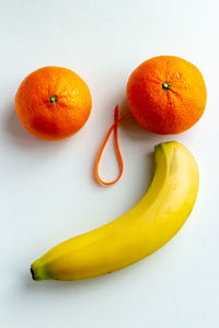 High angle view of orange against white background