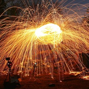 Firework display at night