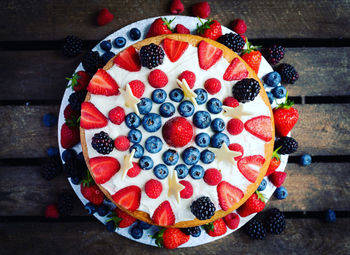 Directly above shot of strawberry cake on table