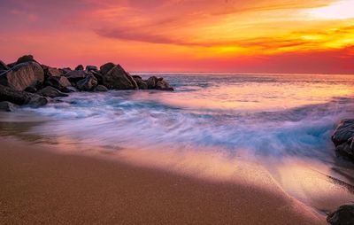 Scenic view of sea against sky during sunset