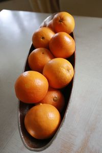 Close-up of orange fruits on table
