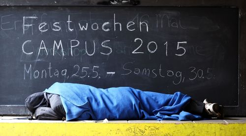 Close-up of text on wall