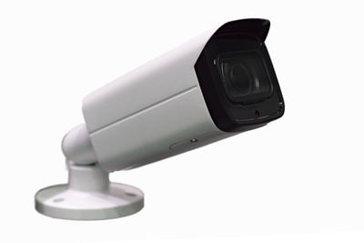 Close-up of camera against white background