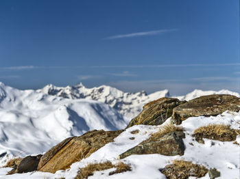 Scenic view of snowcapped mountain against sky