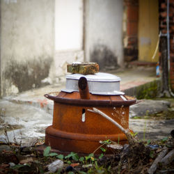 Abandoned rusty wood burning stove