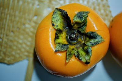 High angle view of orange fruit on table