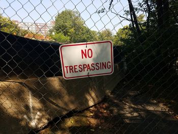 Information sign on chainlink fence