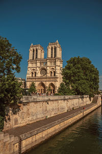 View of historical building against clear blue sky