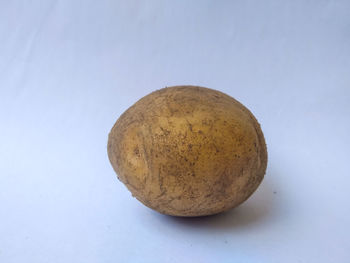 Close-up of apple against white background