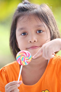 Close-up portrait of cute girl with woman