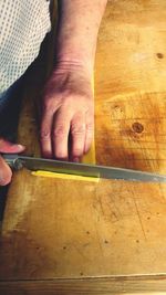 Close-up of man working on table