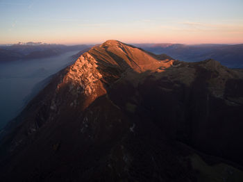 Scenic view of mountains against sky during sunset