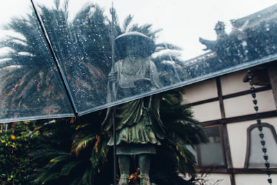 Close-up of wet window during winter