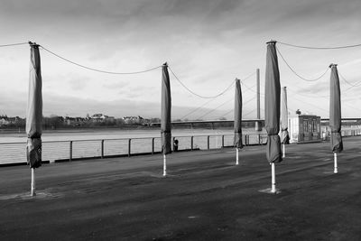 View of fence with buildings in background