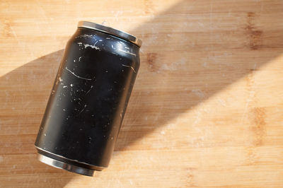 High angle view of black coffee on table