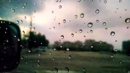 Close-up of water drops on glass