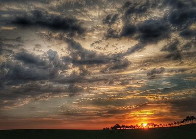 Scenic view of dramatic sky during sunset