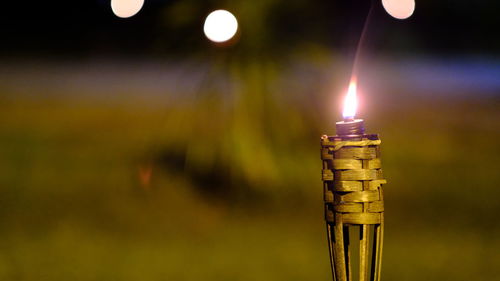 Close-up of illuminated lighting equipment