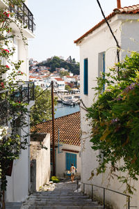 Houses in town against sky