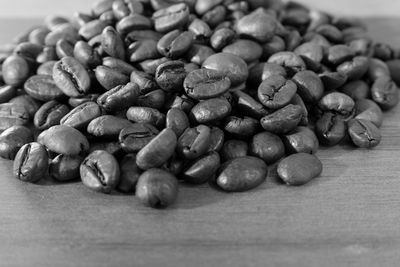 Close-up of coffee beans on table