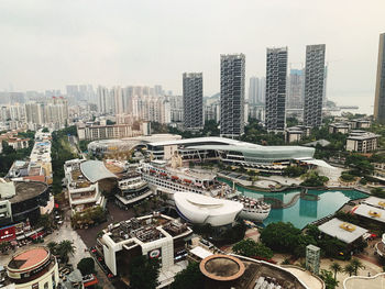 High angle view of buildings against sky in city