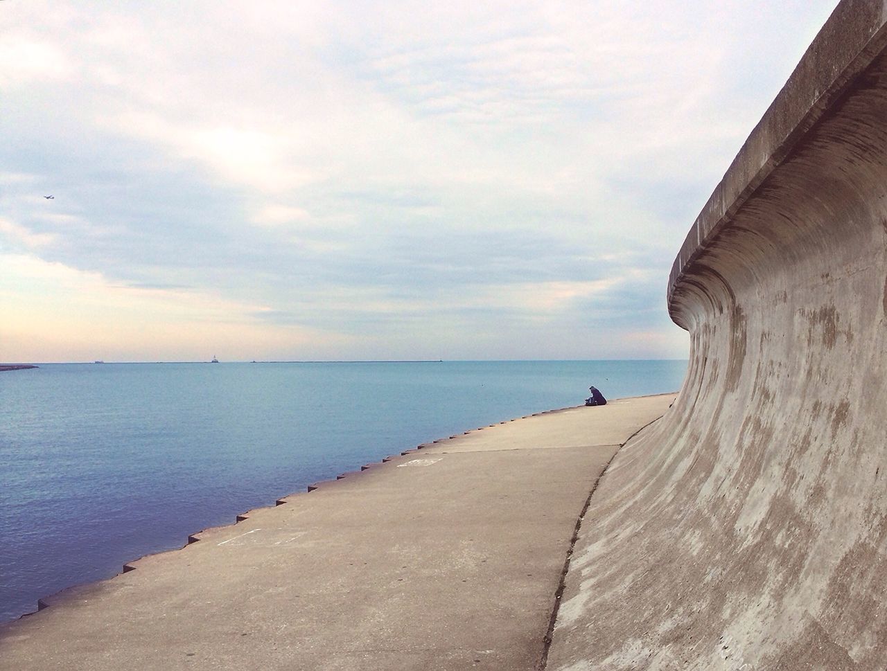 sea, horizon over water, sky, water, cloud - sky, beach, scenics, cloud, tranquility, tranquil scene, built structure, cloudy, beauty in nature, pier, shore, nature, architecture, idyllic, day, outdoors