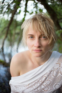 Portrait of woman in forest