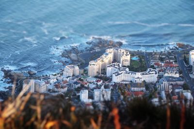 High angle view of cityscape by sea