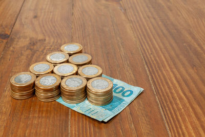 High angle view of coins on table