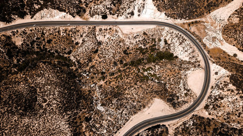 Aerial view of road amidst desert