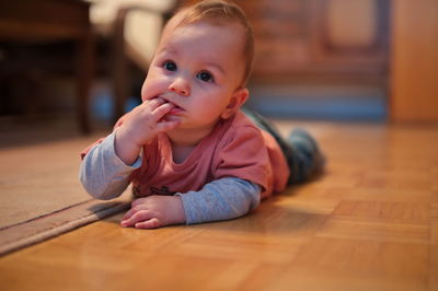 Little baby boy crawling at home