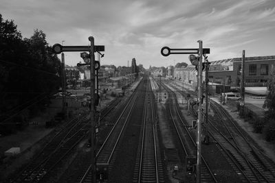 High angle view of railroad tracks in city against sky