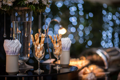 Close-up of candles on table