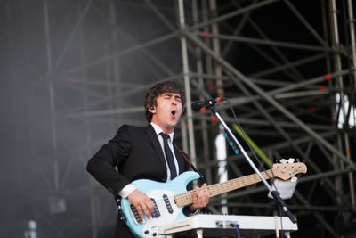 Young man playing guitar