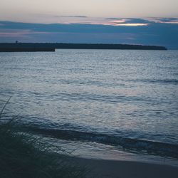 Scenic view of sea at sunset