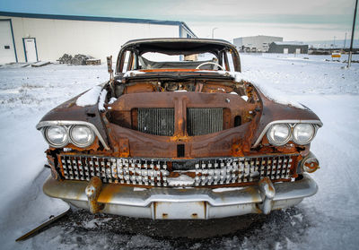 Close-up of vintage car on snow