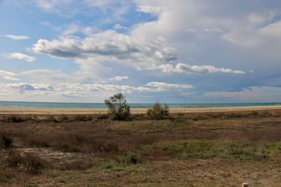 Scenic view of land against sky