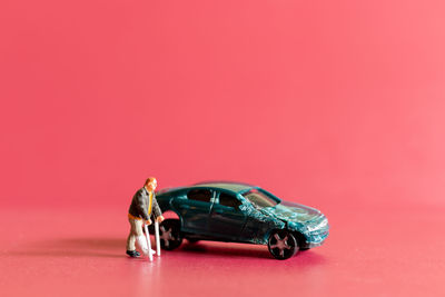 High angle view of woman wearing red car