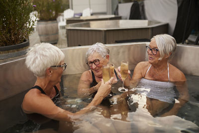 Senior women relaxing in hot tub