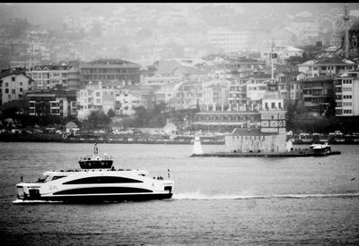 Nautical vessel on river in city