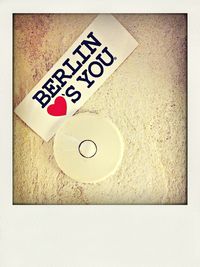 Close-up of text on wall