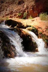 Stream flowing through rocks