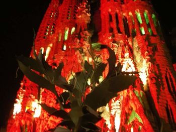 Low angle view of red lights at night