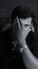 Close-up of young man looking away