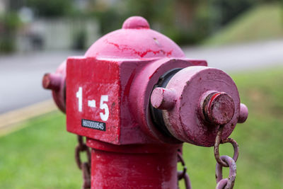 Close-up of fire hydrant on field