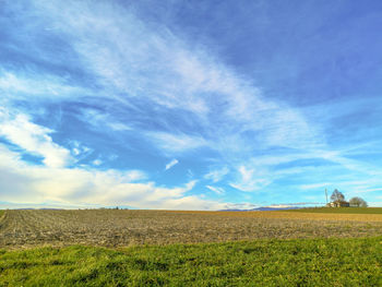 Scenic view of field against sky