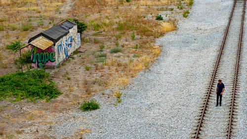 High angle view of people walking on footpath