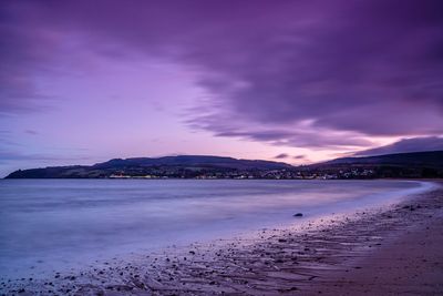 Scenic view of sea against dramatic sky