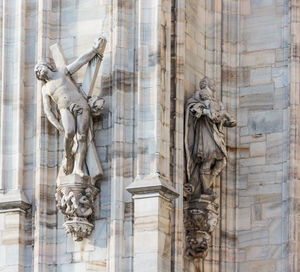 Close-up of statues on historical building
