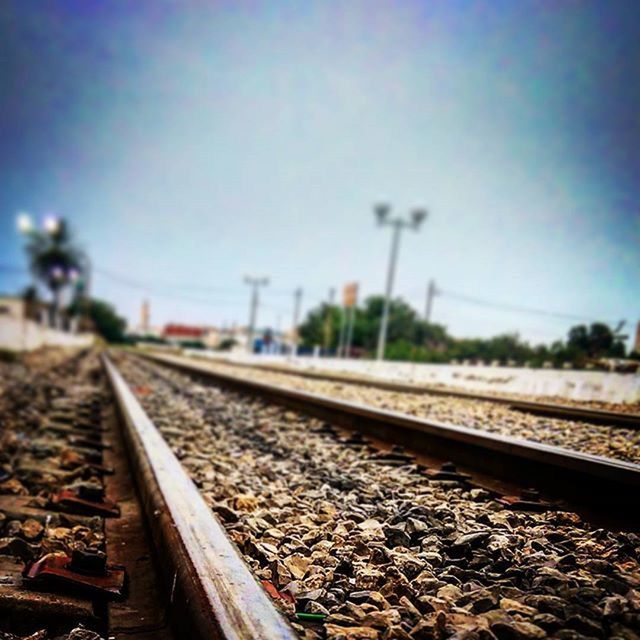 RAILWAY TRACKS AGAINST SKY